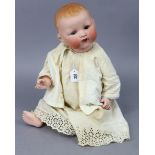 An Armand Marseille bisque-head large baby doll (A. M. Germany 351/10.k) with blue sleeping eyes,