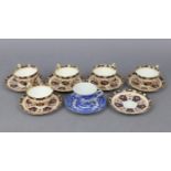 A late Victorian floral decorated china eleven-piece part tea service; & a blue & white transfer-