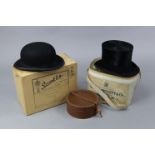 A Henry Heath of London black silk top hat; together with a Lock & Co. of London black felt bowler