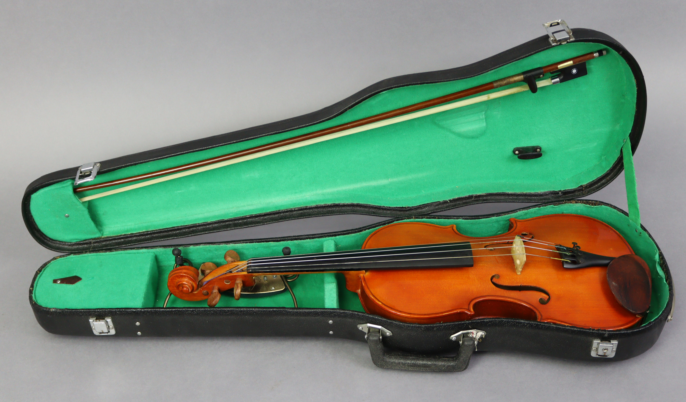 A “Stentor Student” violin & bow by Stentor Music of England, 24” long, with case.