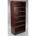 A mahogany-finish tall standing open six-tier bookcase, on plinth base, 34½” wide x 73½” x 14¾”