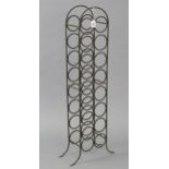 A wrought-iron sixteen-division wine-rack, 8¾” wide x 41” high.