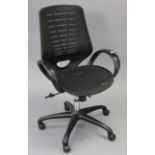 A black plastic swivel desk chair.