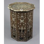 An eastern hardwood octagonal occasional table with all-over bone, mother-of-pearl & brass inlaid