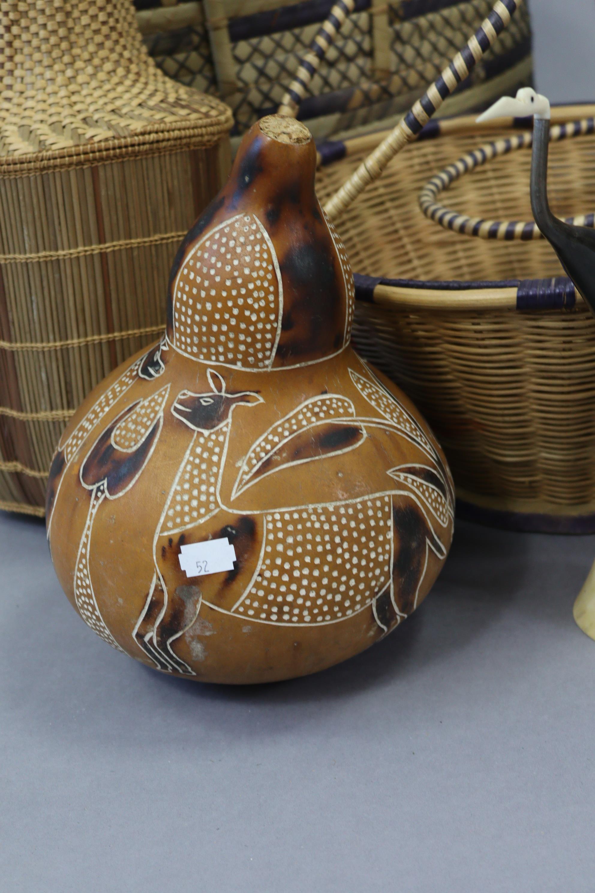 A Japanese-style metal table lamp; an Aboriginal gourd vessel, various similar wicker baskets & bow - Image 3 of 5