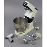 A Kenwood food mixer, with various accessories.