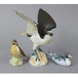 A Spode bone china model of an “Osprey”, 11¾” high; a Royal Copenhagen model of a duck, 6¼”