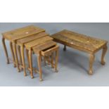 An eastern carved hardwood nest of four rectangular occasional tables, each table on four slender