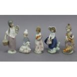 Five various Lladro porcelain ornaments.