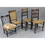 Two spindle-back cottage dining chairs with woven rush seats, & on turned legs with turned