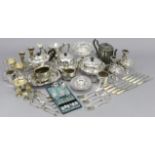 A silver-plated oval teapot; a silver-plated comport; two silver-plated muffin-dishes; & various