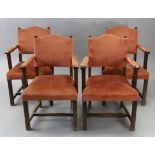 A set of four beech-frame carver dining chairs with padded seats, backs, & arms upholstered