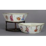 A PAIR OF 19th century CHINESE PORCELAIN BAT-SHAPED BOWLS, each with gilt rim, decorated in family