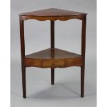 A 19th century mahogany two-tier corner table, with plain top & shaped friezes, the lower tier