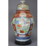 A 19th century Japanese Imari porcelain large baluster vase, decoration with alternating panels