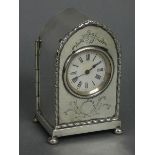 An Edwardian silver lancet-cased timepiece with raised husk border & engraved leaf-scroll