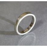 A 9ct. white gold plain band; size: P/Q, weight: 5 gm.