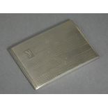 A silver engine-turned cigarette case with engraved initials to one side, the interior engraved with