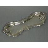 A William IV silver pen or snuffers tray of waisted oblong shape with raised scroll border, 9¾”