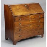 n 18th century mahogany bureau with fitted interior enclosed by sloping fall-front, above four long