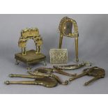 Five various 19th century Indian brass & steel betel nut cutters; a gilt-brass miniature