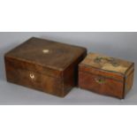 A 19th century kingwood-veneered rectangular box of serpentine outline, gilt brass carrying handle