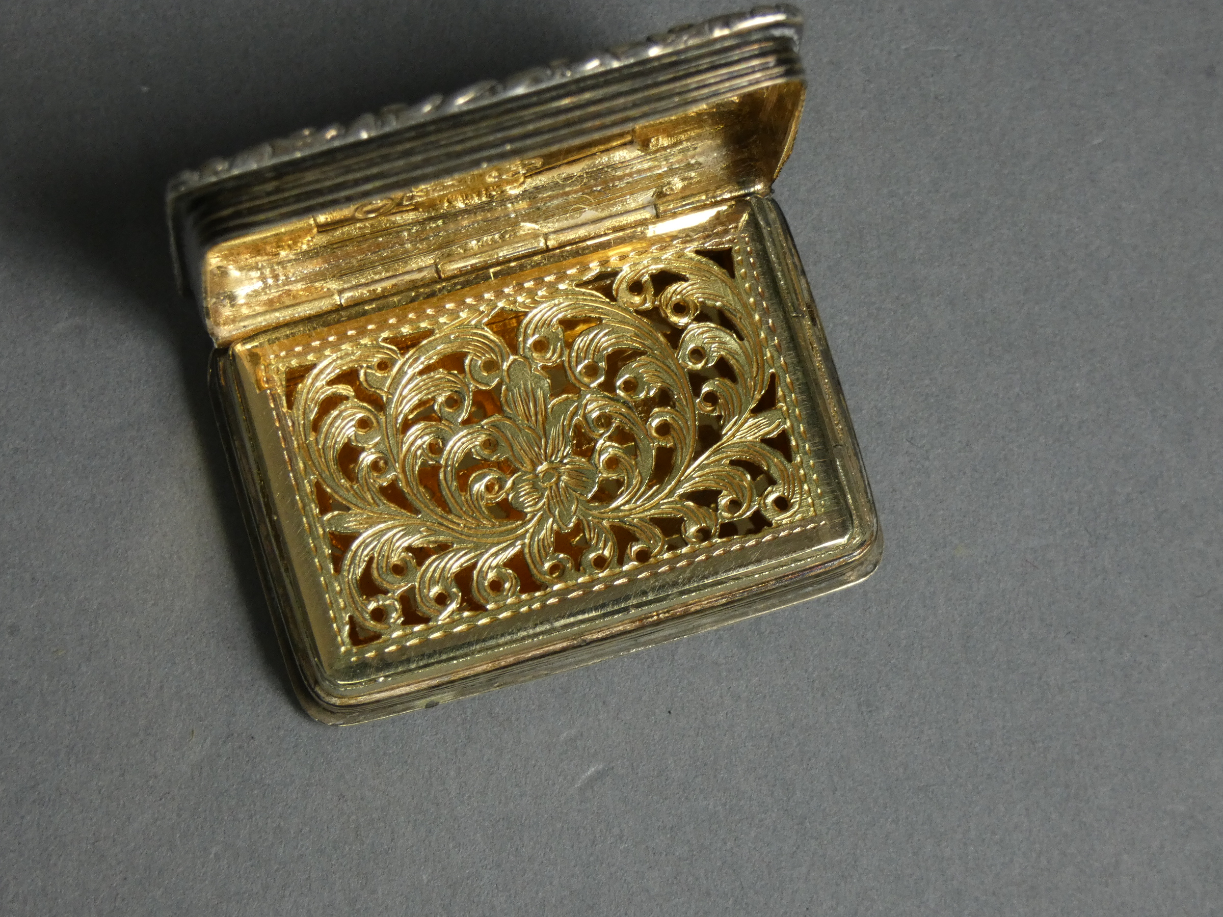 An early Victorian silver vinaigrette of rectangular shape, with engine-turned decoration & carved - Image 2 of 4