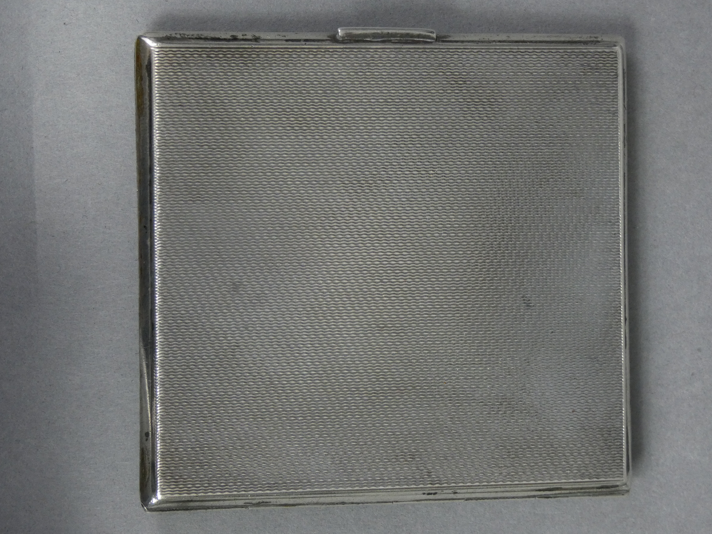 A silver engine-turned pocket cigarette case with engraved Army Chaplain’s badge, the interior - Image 2 of 3