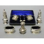 A pair of late Victorian silver small thistle-shaped salt cellars & spoons, Birmingham 1897, by John