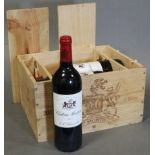 Six bottles of Chateau Montrose 2001 Saint-Estephe, Grand Cru Classe vintage Bordeaux red wine, in
