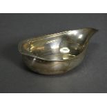 A George III silver pap boat with reeded rim & pointed end, 5” long; London 1818, maker’s mark