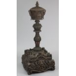 AN UNUSUALLY LARGE 19TH CENTURY INDIAN TEAK FLOOR-STANDING CEREMONIAL URN, profusely carved all-over