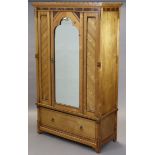 AN ARTS & CRAFTS ASH WARDROBE IN THE MANNER OF CHARLES BEVAN, inlaid with various exotic woods,
