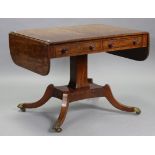 A regency mahogany sofa table, with ebonised line inlay, fitted two frieze drawers to one side