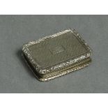 A George IV silver vinaigrette of rectangular shape, engine-turned decoration & carved scroll