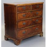 A George III chest, inlaid with rosewood crossbanding, ebonised & boxwood stringing, & fan petrae,