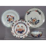 An 18th century Chinese Imari shallow dish with foliate border & café-au-lait rim, 9”; two similar