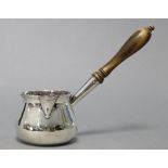 An early George III silver brandy saucepan of squat round shape, with engraved monogram & turned
