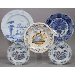 A pair of 18th century English Delft 9” plates with polychrome decoration of a fenced garden (one