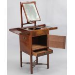 An early-mid 19th century mahogany washstand with envelope top, fitted with an adjustable rise-&-