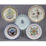 Five various 18th/19th century French faience plates with painted floral decoration 3 x 9”, 1 x 9½”,