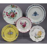 Five various 18th/19th century French faience plates with painted floral decoration, 1 x 12”, 1 x