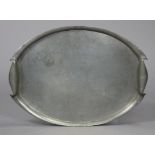 A Tudric pewter Arts & Crafts oval two-handled tray designed by Archibold Knox for Liberty & Co.,