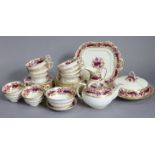 An early 20th century English porcelain tea service in the regency style, the wide borders decorated