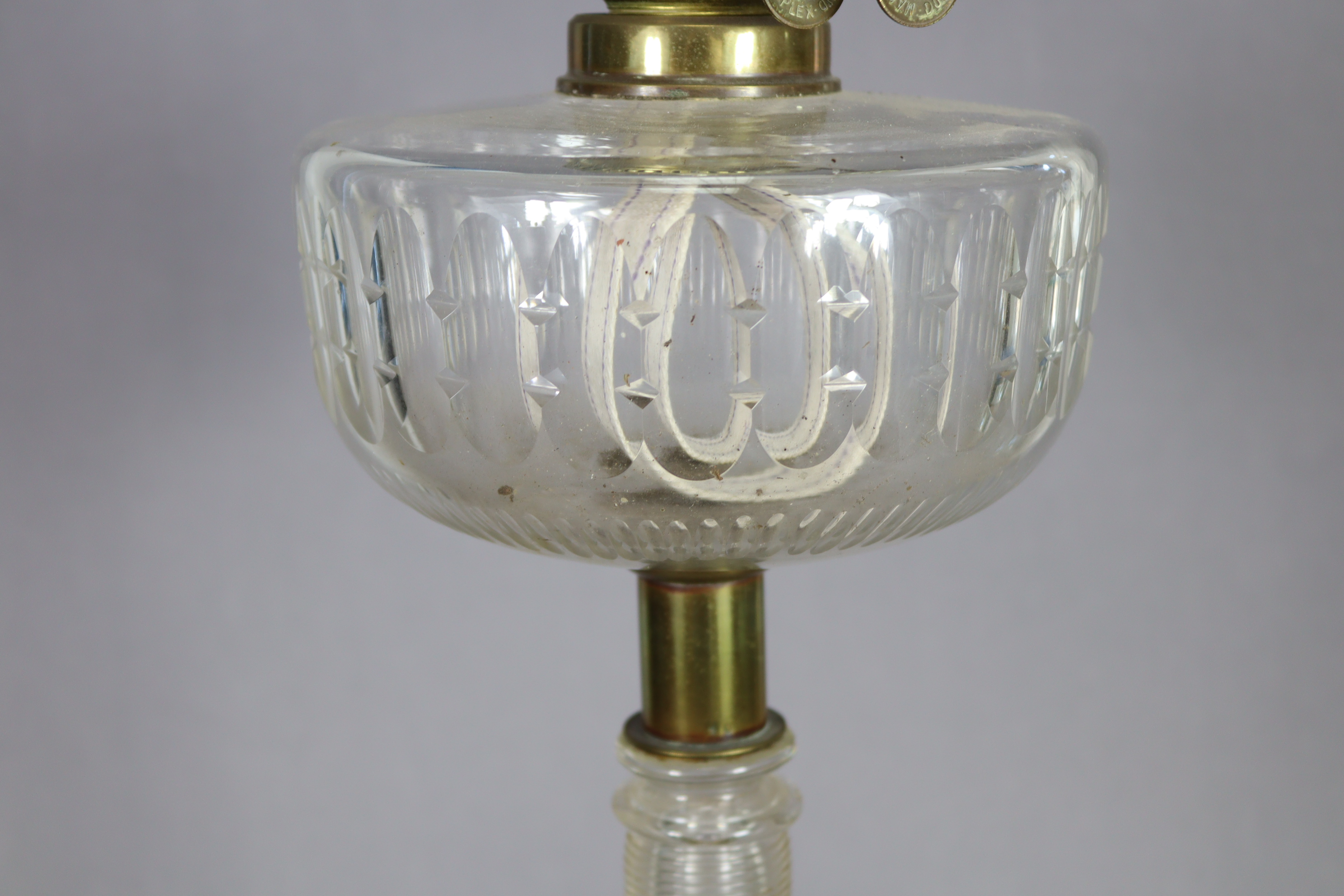 A Victorian large oil lamp with cut-glass reservoir, on ribbed baluster column & circular base - Image 6 of 8