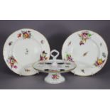 A pair of early 19th century Swansea-style porcelain dessert plates with painted bouquets &