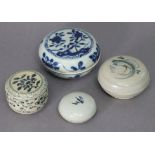 Four various blue & white porcelain circular boxes & covers, including a floral-decorated “Hoi An”