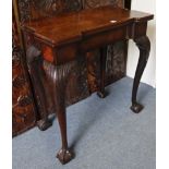 A GEORGE II MAHOGANY TEA TABLE, with rectangular inverted break-front fold-over top, on four