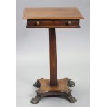 A William IV mahogany & rosewood work table, the hinged rectangular top with moulded edge, on