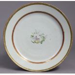 An 18th century Chinese export porcelain charger, finely painted to the centre with a dove,